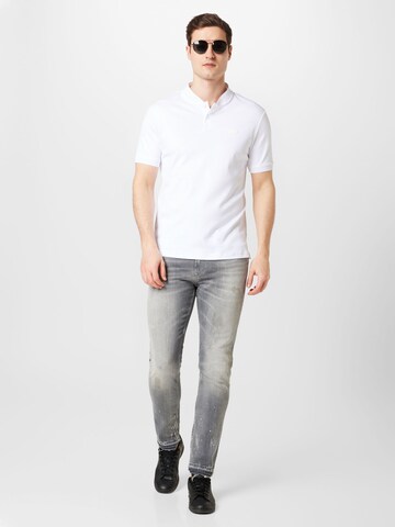 Calvin Klein Bluser & t-shirts i hvid