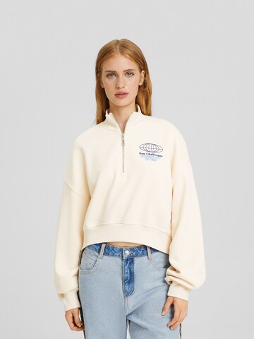 Sweat-shirt Bershka en beige : devant