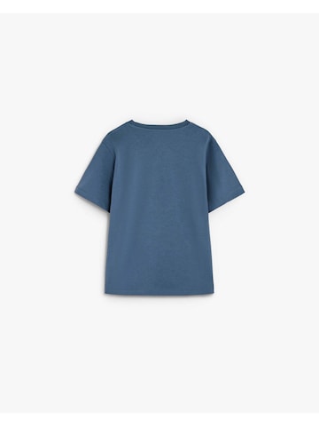 T-Shirt ' ' Scalpers en bleu : derrière
