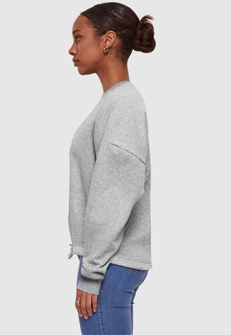 Merchcode Sweatshirt 'Think Different' in Grau