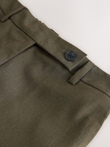 Next Alt laienev Viikidega püksid, värv roheline