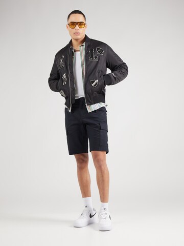 Champion Authentic Athletic Apparel tavaline Klapptaskutega püksid, värv must