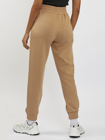 FRESHLIONS Tapered Pants in Brown