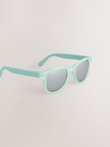 Next Aurinkolasit värissä vihreä