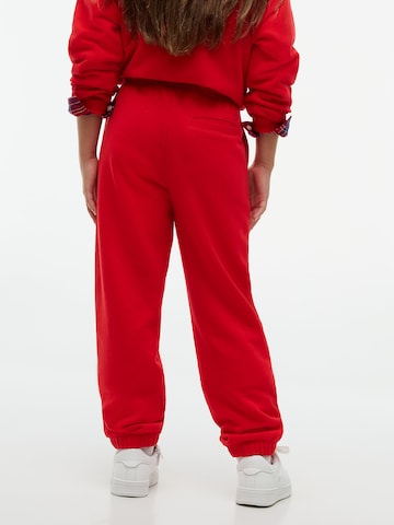 Effilé Pantalon TOMMY HILFIGER en rouge