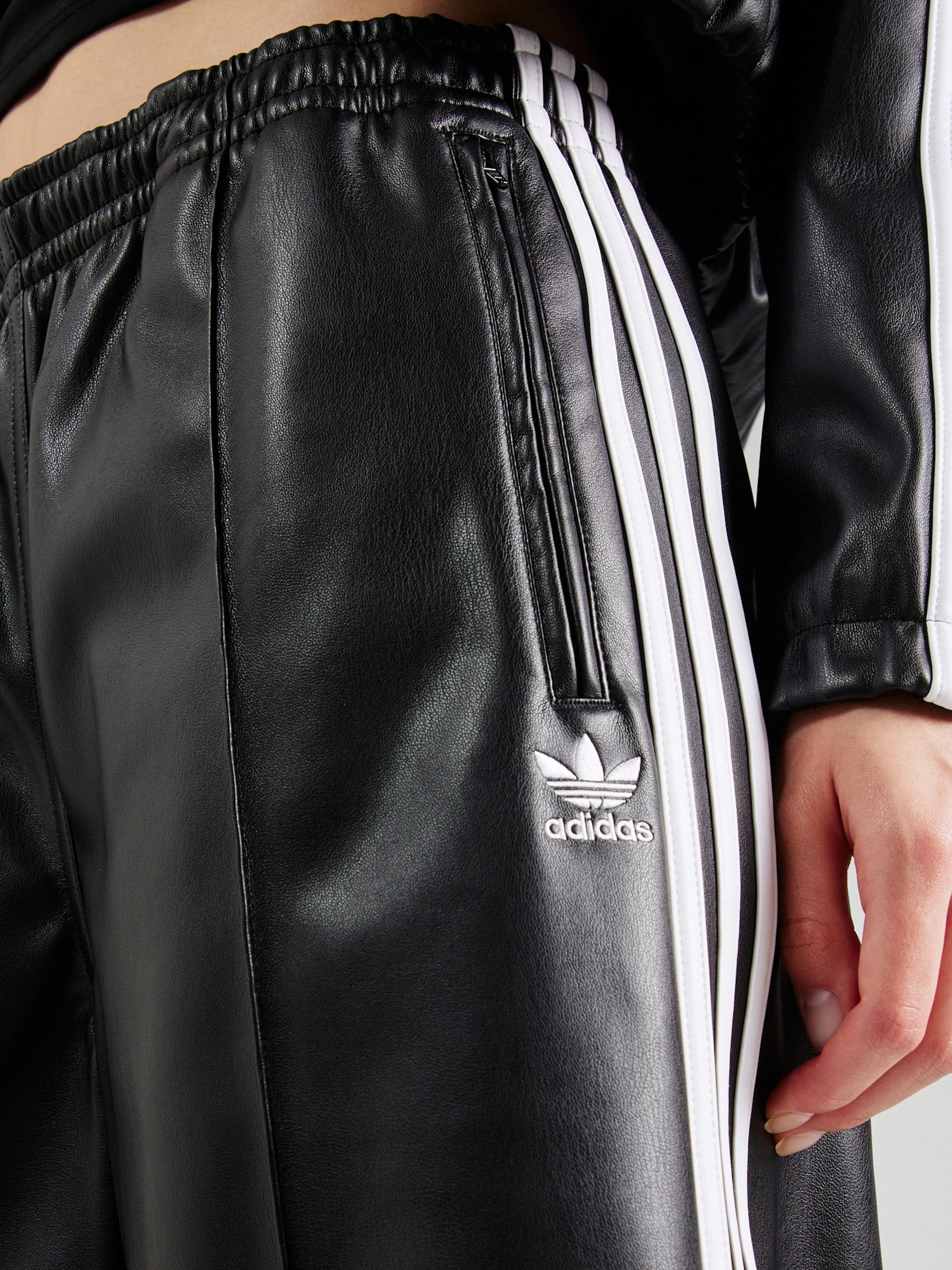 ADIDAS ORIGINALS Wide leg Pants Firebird in Black ABOUT YOU