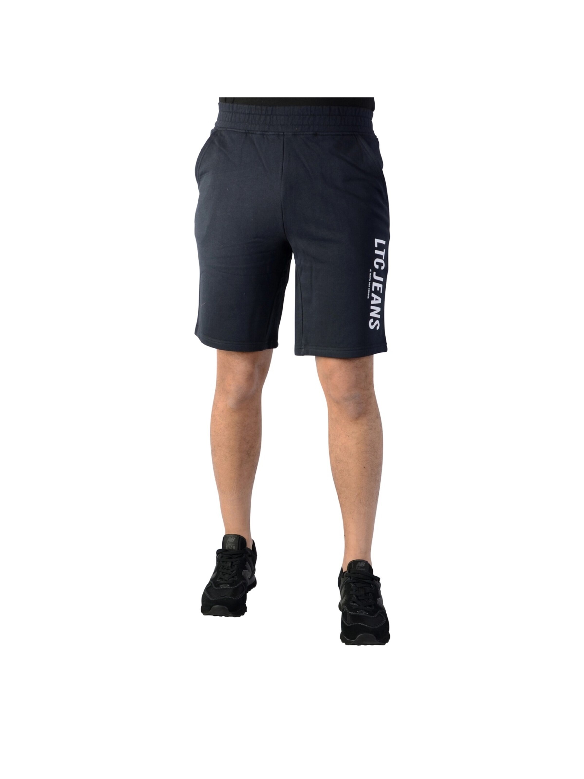 Le Temps Des Cerises Regular Trousers in Black: front