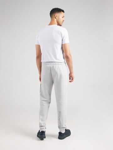 ELLESSE Tapered Hose 'Naisi' in Grau: Rückseite