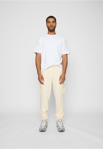 Loosefit Pantaloni cargo 'Light Terry' di Urban Classics in beige