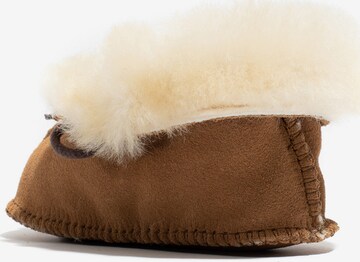 Minnetonka Boots 'Sheepskin' in Brown
