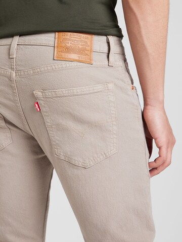 LEVI'S ® Tapered Jeans '512' in Beige
