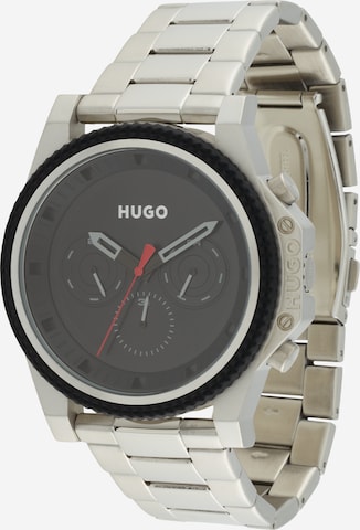 HUGO Red Analog klocka '#BRAVE' i silver: framsida