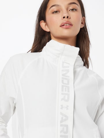 Jachetă de trening de la UNDER ARMOUR pe alb