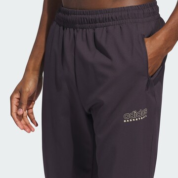 ADIDAS PERFORMANCE Tapered Sports trousers in Black