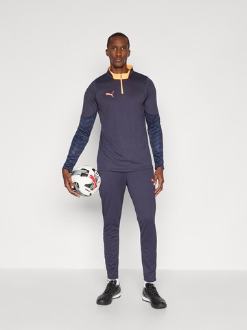 PUMA Regular Sports trousers 'Individual CUP' in Blue