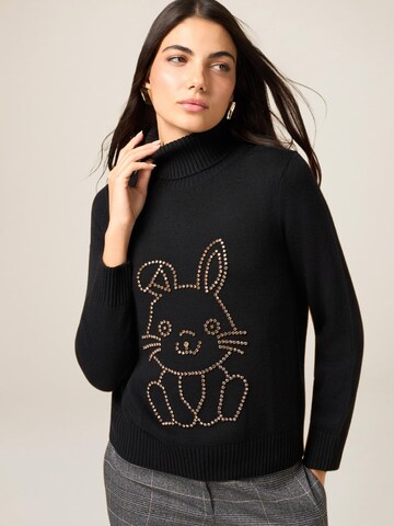 Pullover di oltre in nero