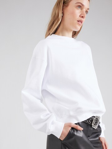 Sweat-shirt 'Essence Standard' WEEKDAY en blanc