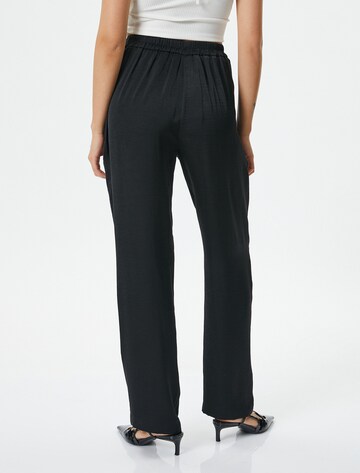 Koton Loose fit Pleat-front trousers in Black