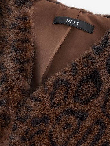 Next - Chaleco en marrón
