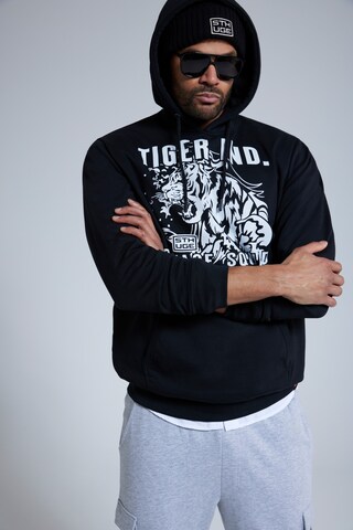 Sweat-shirt STHUGE en noir : devant