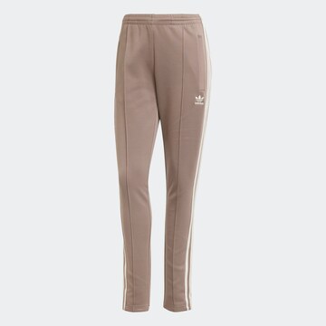 ADIDAS ORIGINALS Slim fit Pants 'Adicolor Sst' in Brown: front
