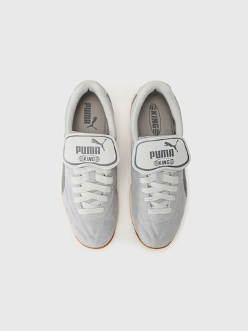 Baskets basses 'King' PUMA en gris