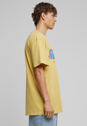 MT Upscale - Camiseta 'F*ke L*ve' en amarillo