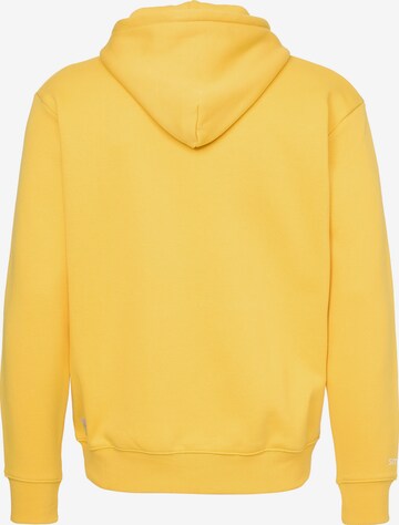 Sweat-shirt 'Happy' smiler. en jaune