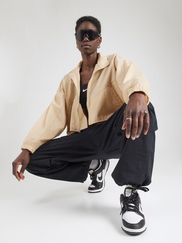 Nike Sportswear Between-season jacket in Beige