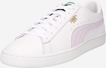Baskets basses PUMA en blanc : devant