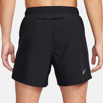 NIKE Regular Workout Pants 'CHALLENGER' in Black