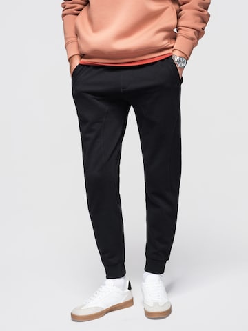 Effilé Pantalon de sport Ombre en noir