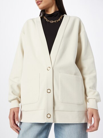 Sisley Cardigan i beige