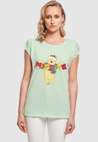 ABSOLUTE CULT T-Shirt 'Winnie The Pooh - Festive' in Grün: predná strana