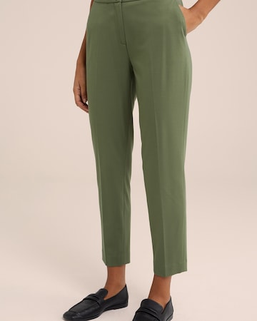 Slimfit Pantaloni con piega frontale di WE Fashion in verde: frontale