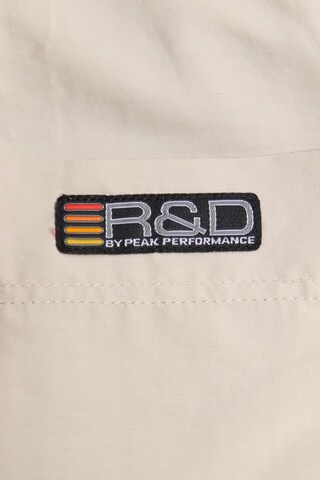 PEAK PERFORMANCE Pants in 31-32 in Beige