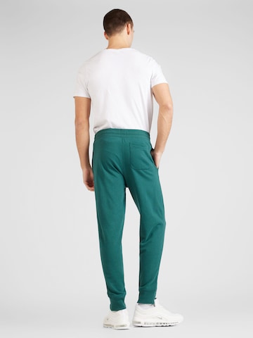GAP Zwężany krój Spodnie w kolorze zielony