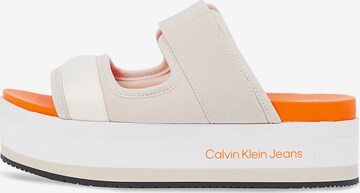 Calvin Klein Jeans Mules in Beige: front