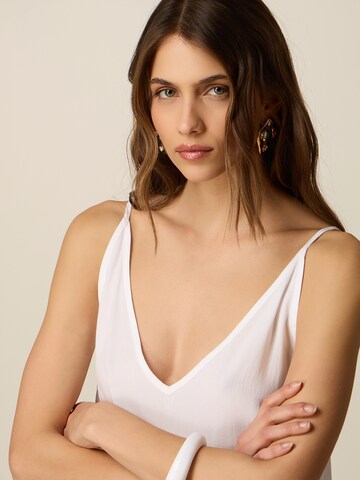 Haut oltre en blanc