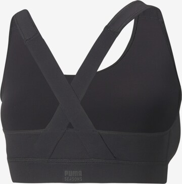 PUMA Bustier Sport-BH in Schwarz