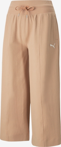 PUMA Wide leg Trousers in Beige: front