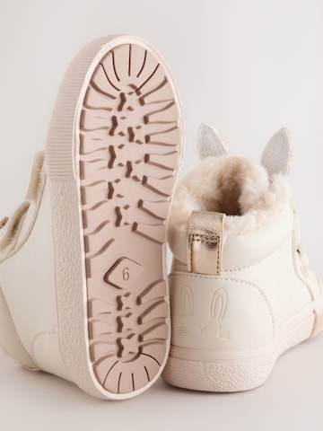 Bottes Next en beige
