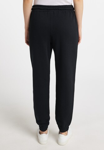 Schmuddelwedda - Tapered Pantalón en negro