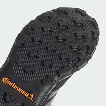 Botine de la ADIDAS TERREX pe negru