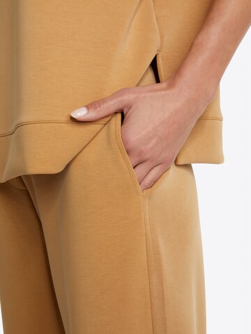 Wide leg Pantaloni di Rich & Royal in marrone