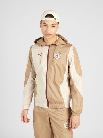 Vestes d’entraînement 'Manchester City Pre-Match' PUMA en beige : devant