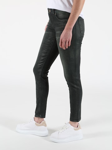 Miracle of Denim Skinny Jeans in Grey: front