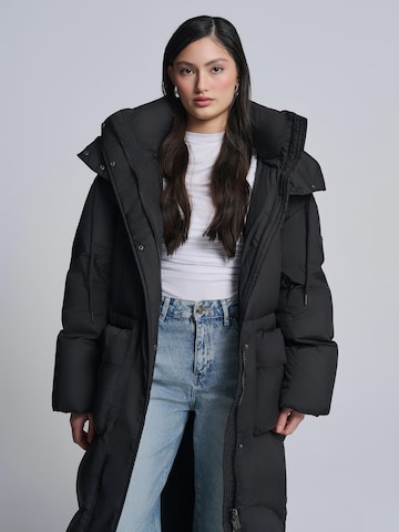 AEMMI Winter Coat in Black