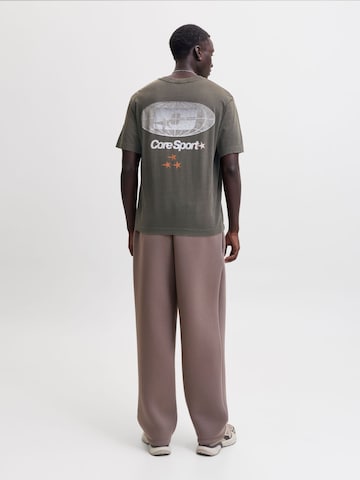JACK & JONES T-shirt 'JCOLEGACY' i grön