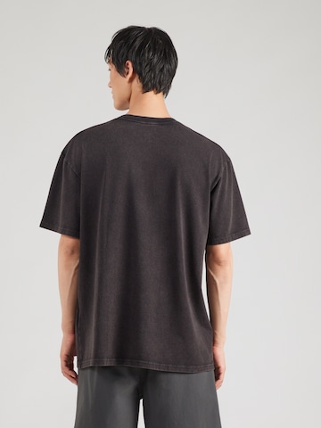 UNDER ARMOUR Performance Shirt in Black